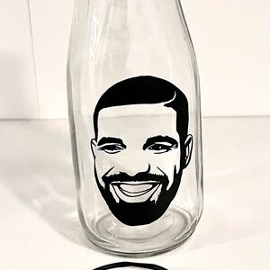 I don’t know why Drake is on a bottle, but he is, and U can own it.